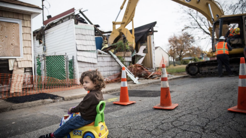 A home on Staten Island’s Oakwood Beach is demolished in 2014.Photographer: Andrew Burton/Getty Images